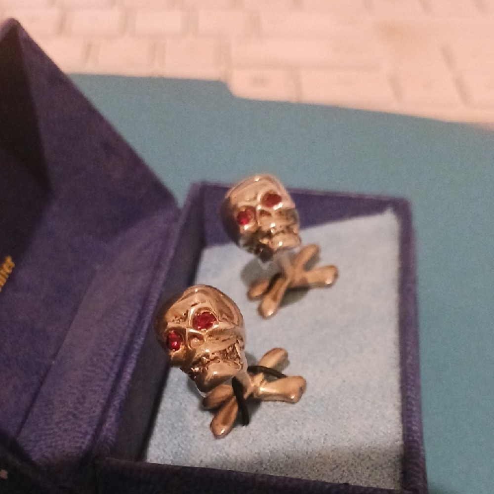 Saks Fifth Avenue Silver Skull Cufflinks with Genuine Ruby Eyes.